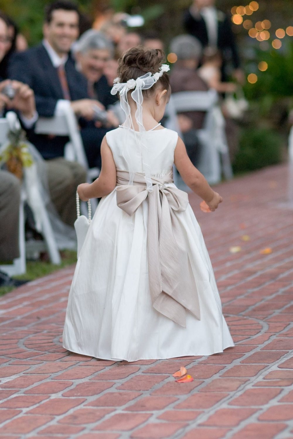 Outdoor ceremony on the brick aisle at The Caldwell House